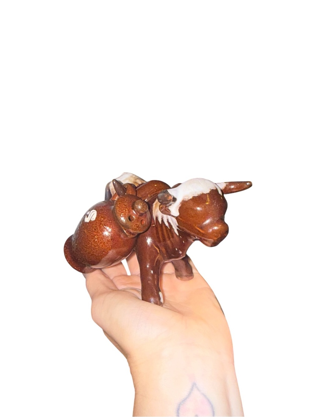 Vintage cow with salt and pepper